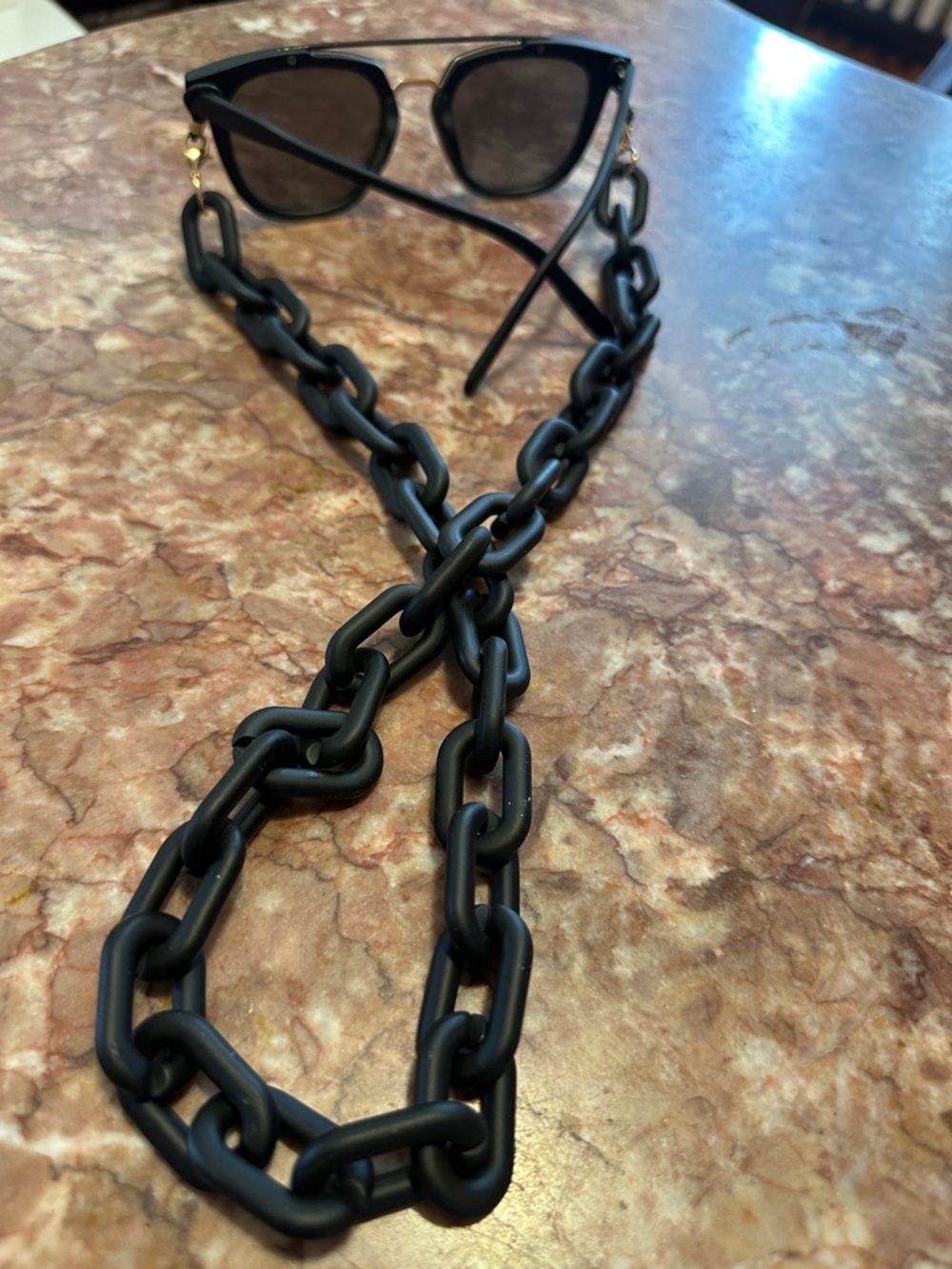 Stylish matte black sunglasses holder